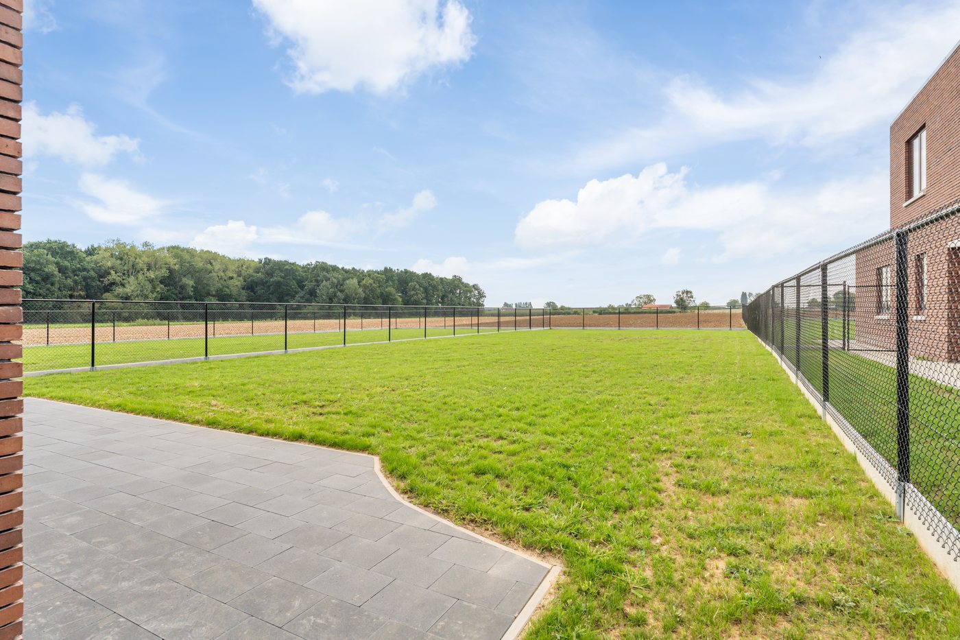 Zicht op het landschap rond de woning