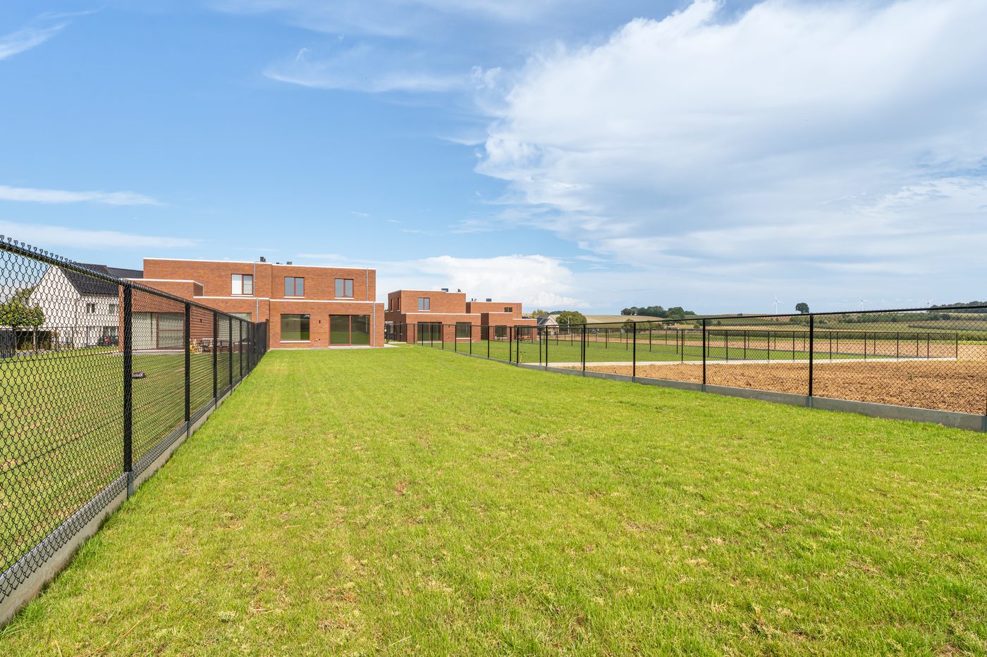 Zicht op het landschap rond de woning